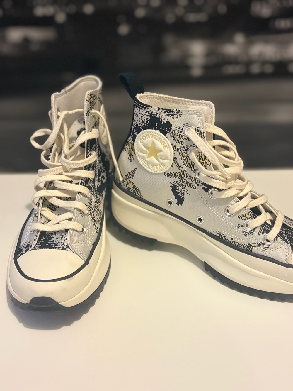 Converse High-Top Platform Sneakers in White and Black Print